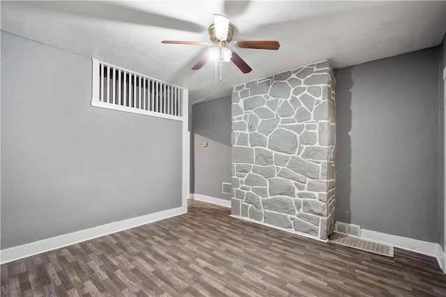 unfurnished living room featuring ceiling fan and hardwood / wood-style floors