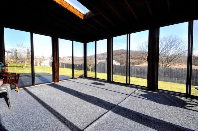 sunroom featuring a skylight