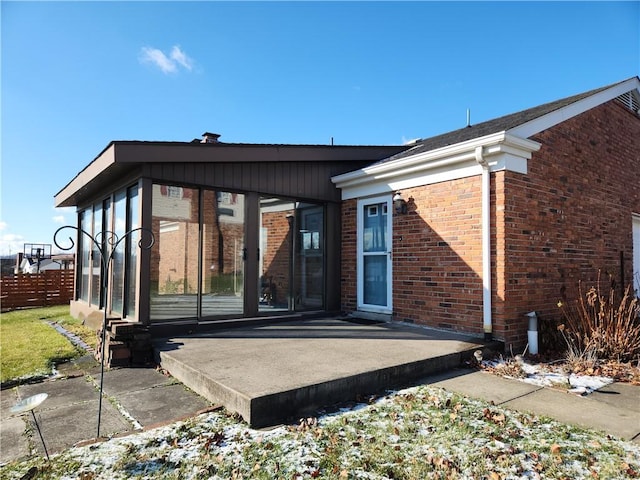 back of property with a patio area