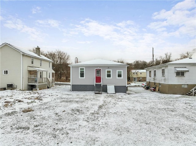 view of snow covered house