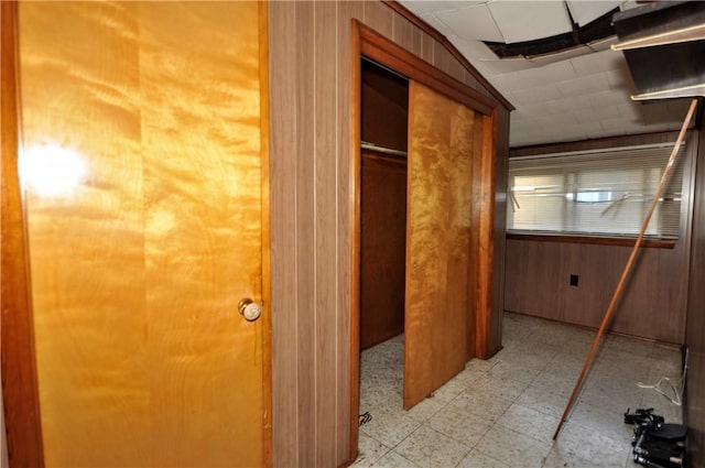 hallway with wooden walls