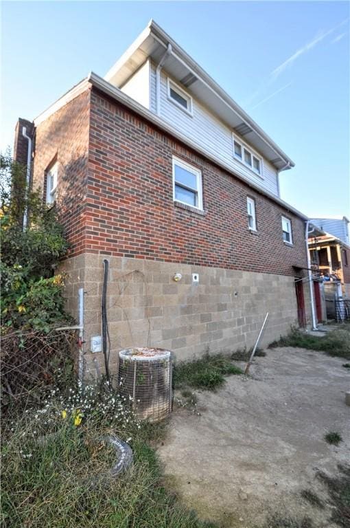 view of home's exterior featuring central air condition unit