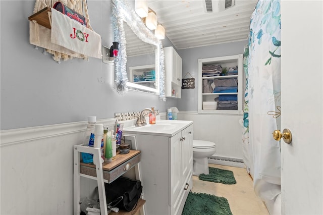 bathroom with a shower with shower curtain, wood ceiling, vanity, a baseboard heating unit, and toilet