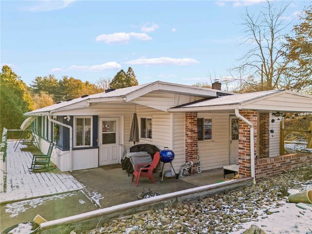 exterior space with a sunroom