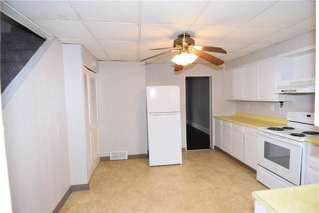 kitchen with ceiling fan, ventilation hood, white appliances, a paneled ceiling, and white cabinets