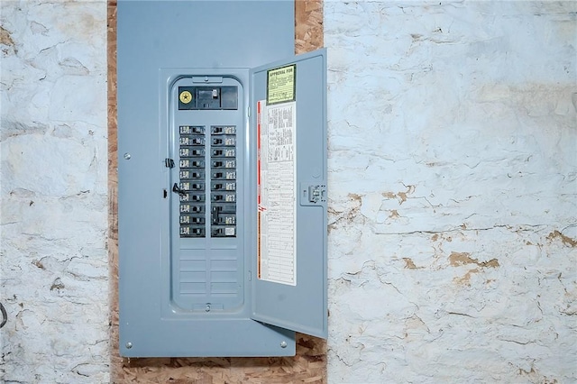 utility room featuring electric panel