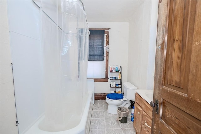 full bathroom with tile patterned flooring, vanity, toilet, and independent shower and bath