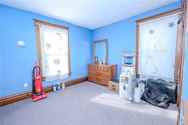 miscellaneous room featuring carpet