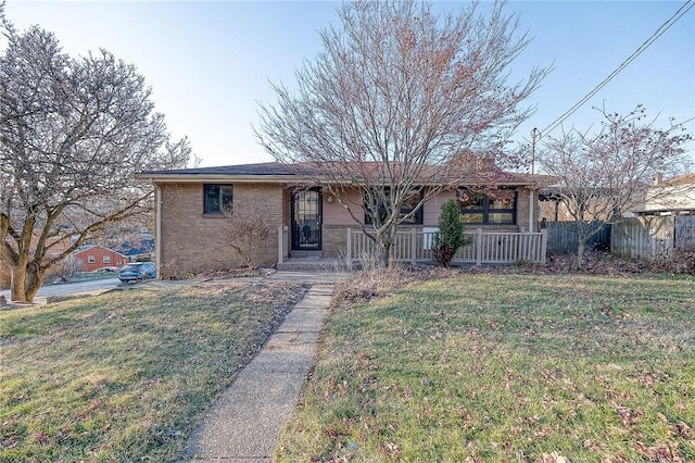 ranch-style house featuring a front lawn