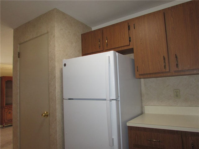 kitchen featuring white refrigerator