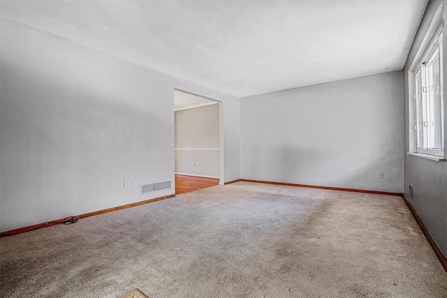 spare room with carpet flooring