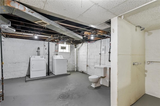 basement featuring washer and dryer