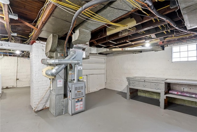 basement featuring heating unit