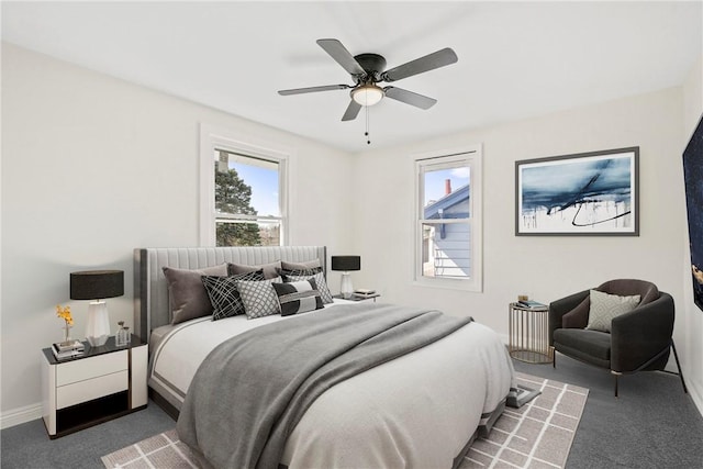 carpeted bedroom with ceiling fan