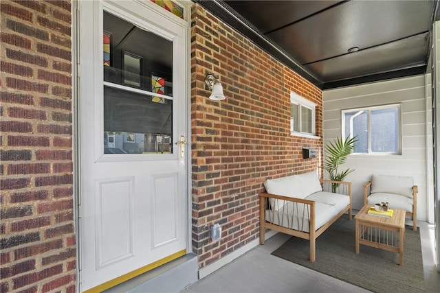 entrance to property featuring a porch