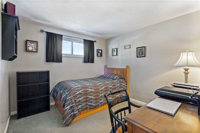 bedroom featuring light carpet