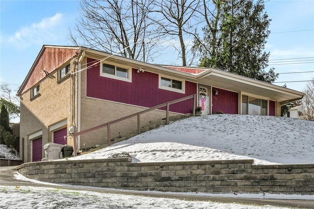 single story home featuring a garage