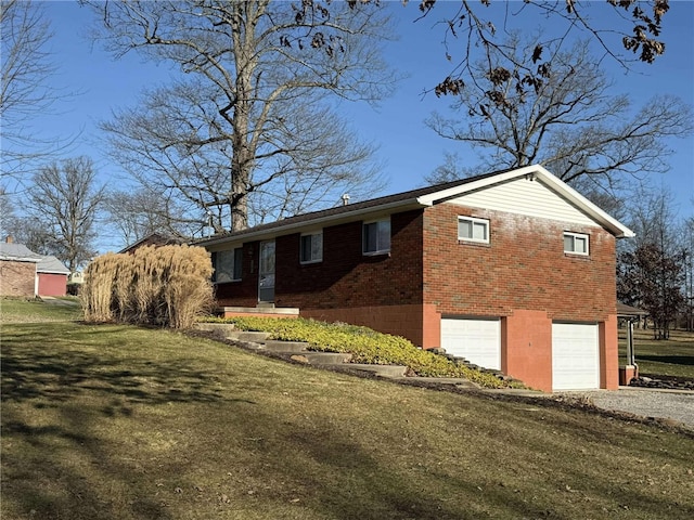 exterior space with a yard and a garage