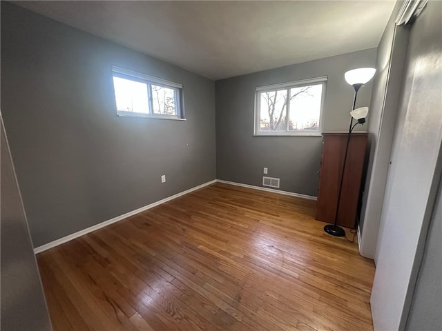 unfurnished bedroom featuring light hardwood / wood-style floors