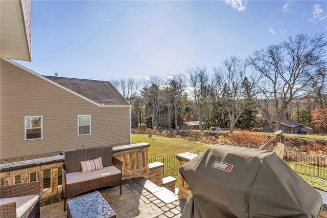 view of patio / terrace featuring a grill and an outdoor hangout area