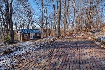 deck featuring an outbuilding