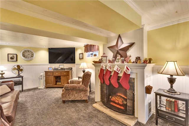 living room featuring carpet, ornamental molding, and wood walls