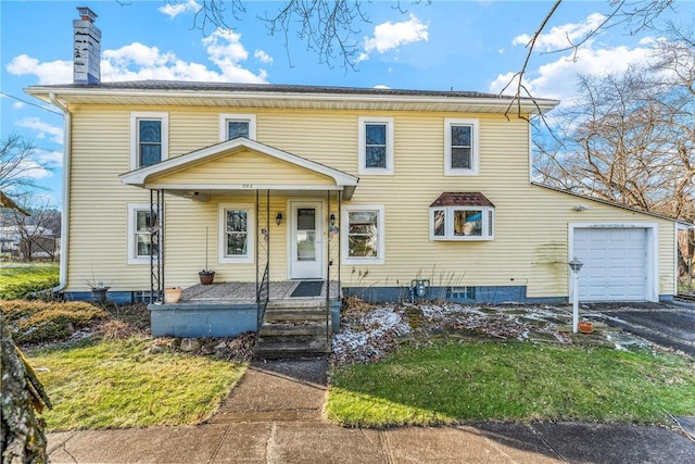 view of front of house featuring a porch and a garage