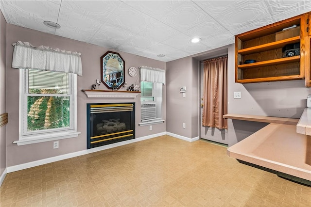 303 Water St, Jamestown, PA 16134 - living area featuring a glass covered fireplace, an ornate ceiling, and recessed lighting