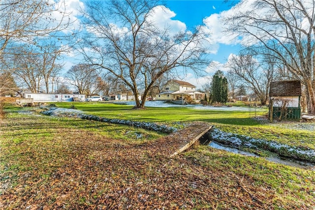 view of yard with a water view