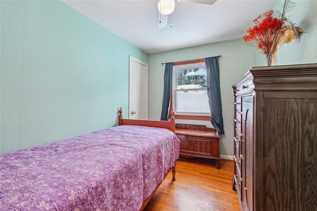 bedroom featuring ceiling fan and light wood-type flooring