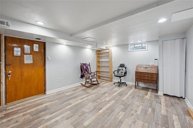 unfurnished room with light hardwood / wood-style flooring