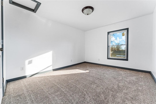 spare room featuring carpet flooring