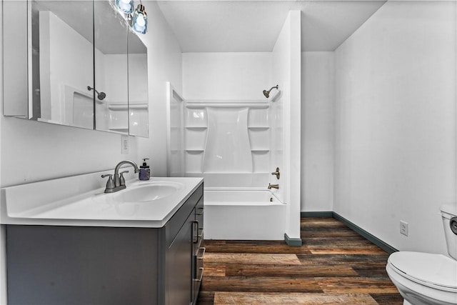 full bathroom with toilet, vanity, shower / bath combination, and hardwood / wood-style flooring