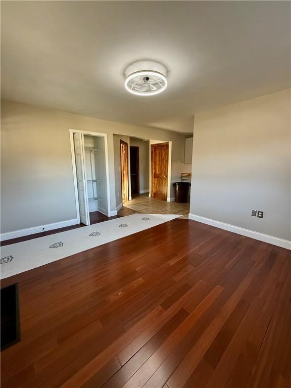 spare room with hardwood / wood-style floors