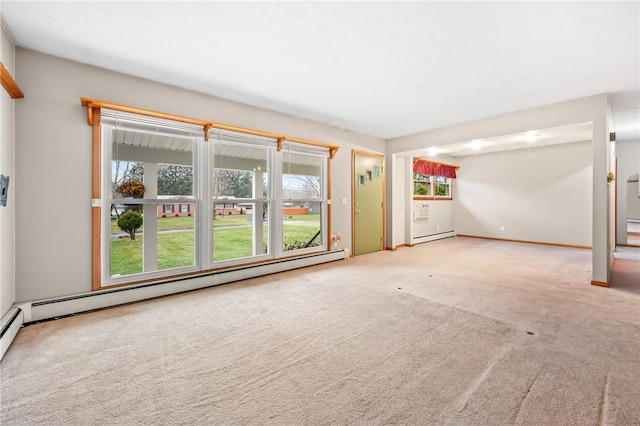 unfurnished living room with light carpet and a baseboard radiator