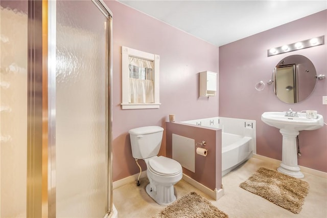 bathroom featuring toilet and plus walk in shower