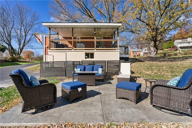 view of patio / terrace with outdoor lounge area and a balcony