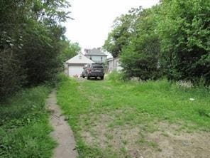 view of yard with a garage