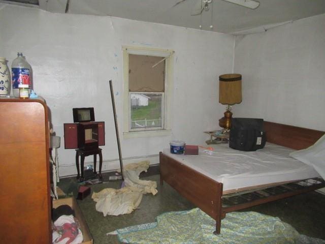 bedroom featuring ceiling fan and pool table