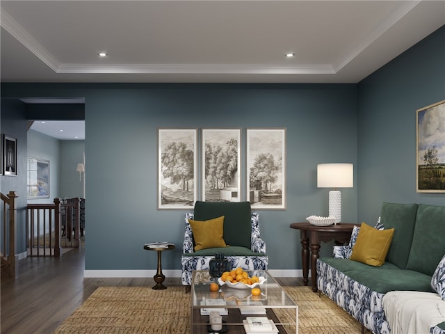 living room with ornamental molding and hardwood / wood-style flooring