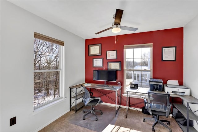 office area with carpet and ceiling fan