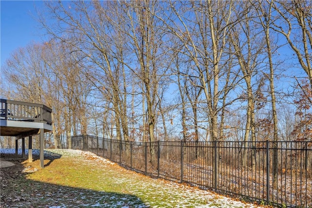 view of yard featuring a wooden deck