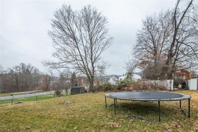 view of yard with a trampoline