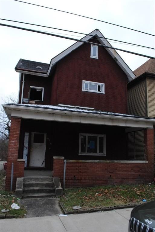 view of front of property featuring covered porch