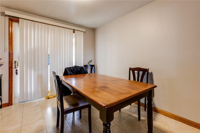 view of tiled dining space