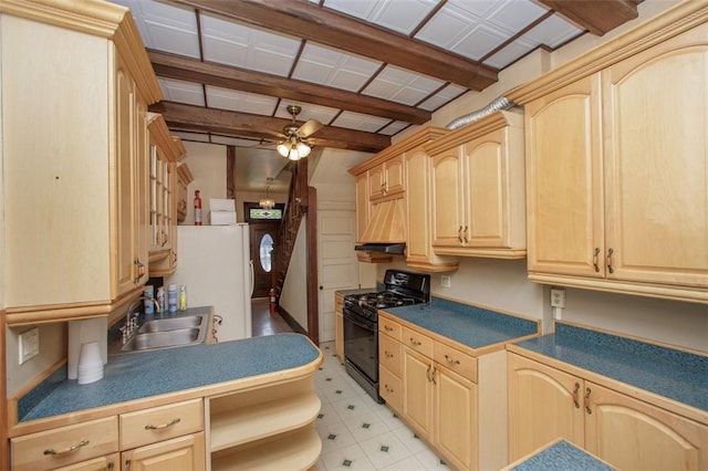 kitchen with black gas range, ceiling fan, sink, white refrigerator, and light brown cabinetry