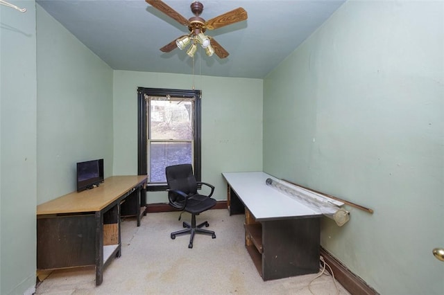 office with ceiling fan and light colored carpet