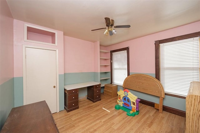 interior space with light hardwood / wood-style floors and ceiling fan