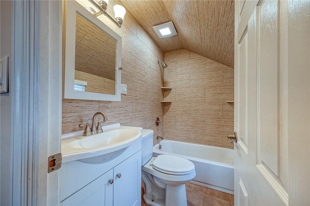 full bathroom with backsplash, vaulted ceiling, toilet, vanity, and tiled shower / bath