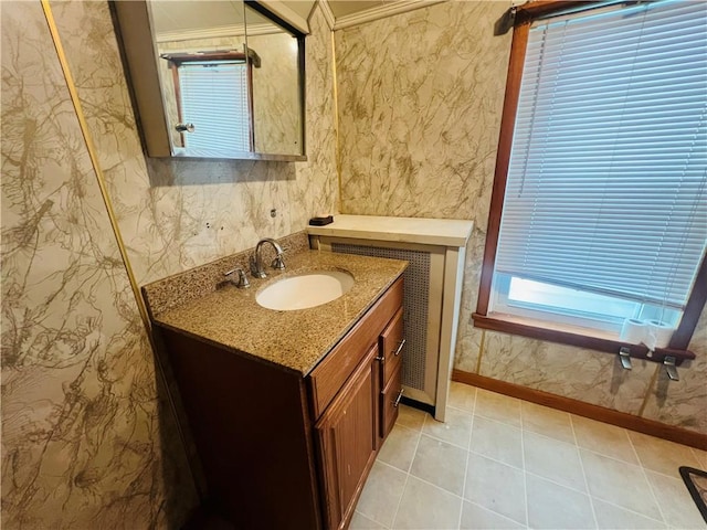 bathroom with vanity and ornamental molding